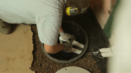 sump pump installation being completed by Standard Water Control